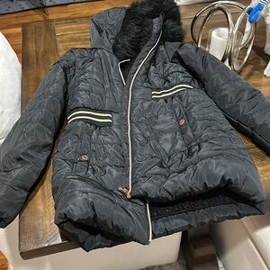 Wonderful coat for a girl size large can fit 9-12
